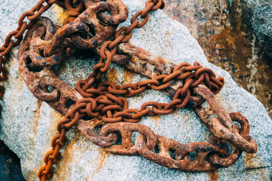 Rusty steel chains suitable for scrap metal recycling at a licensed recycling facility in Adelaide despite surface corrosion.